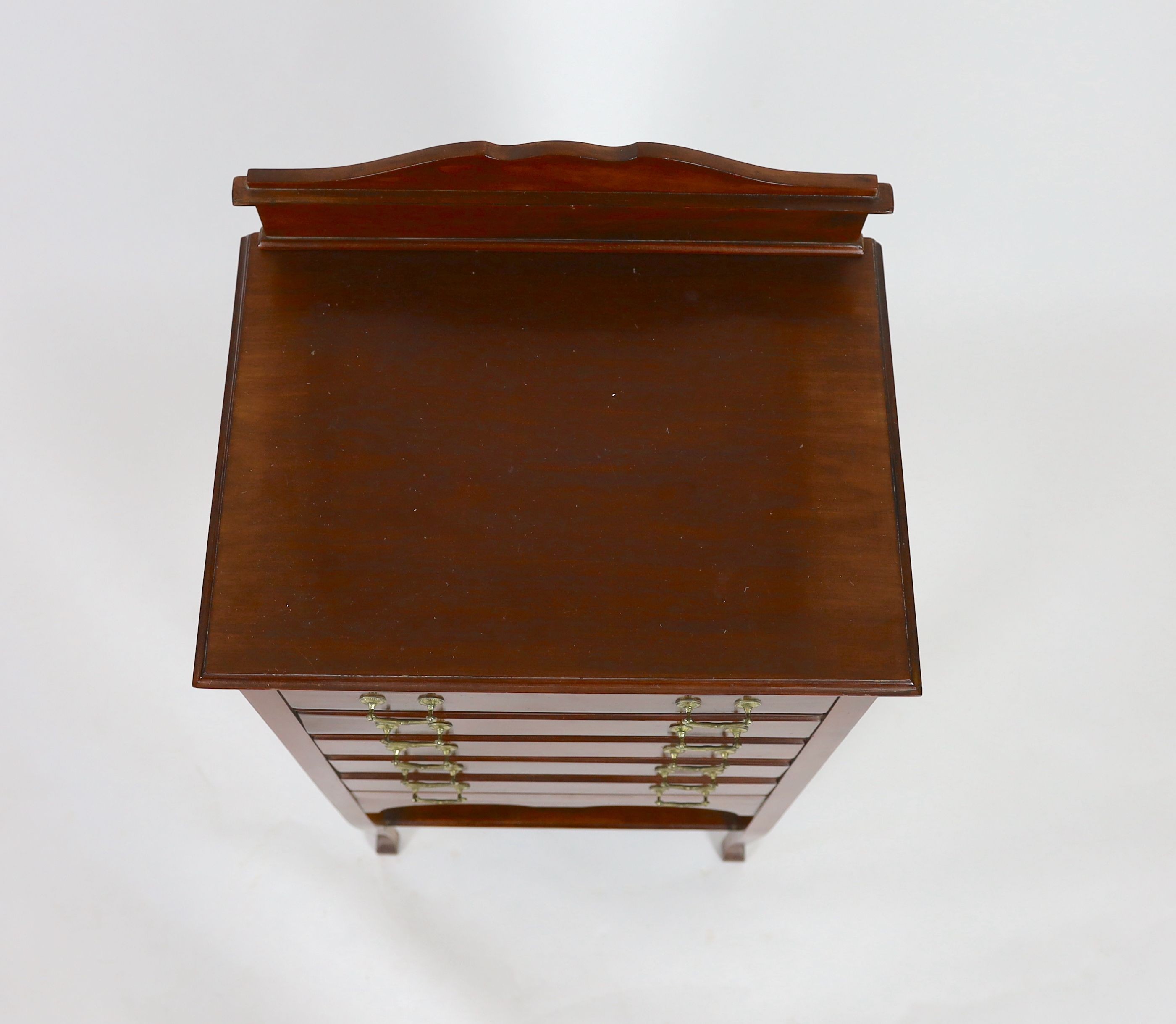 An Edwardian mahogany five drawer music cabinet, width 52cm depth 38cm height 108cm